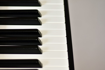 Keys of a digital piano, soft focusing, creative mood of a person improvisation and creativity....