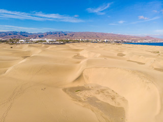 Aerial View of Sand Dunes in Gran Canaria with beautiful coast and beach, Canarian Islands, Spain