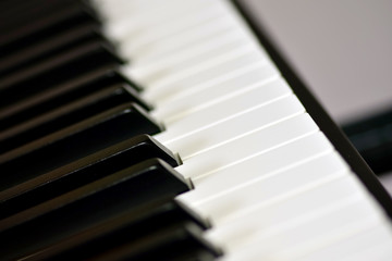 Keys of a digital piano, soft focusing, creative mood of a person improvisation and creativity....