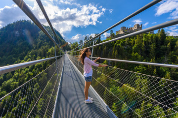 Suspension Bridge at Reutte between two hills in beautiful landscape Scenery of Alps, Tirol, Austria
