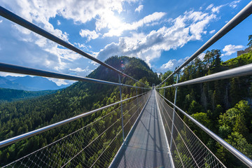 Suspension Bridge at Reutte between two hills in beautiful landscape Scenery of Alps, Tirol, Austria