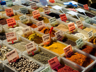 Spices ready for sale with descriptions of each spice on a Turkish market. 