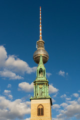 St. Mary's Church and the Television Tower in central Berlin near Alexanderplatz, Marienkirche in...