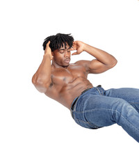 Fototapeta na wymiar Young African man sitting on floor doing push ups