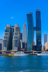 Fototapeta premium View from East Side River to Empire State Building - Manhatten Skyline of New York, USA