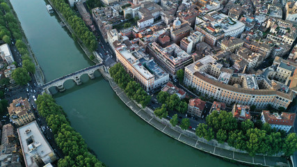 Aerial view of the Tiber River and center of Rome, Italy. Coliseum. Ancient capital. From drone.
