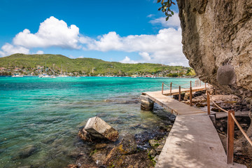 A new cliff side boardwalk trail from Belmont beach to Princess Margaret beach, Bequia Island. - Powered by Adobe