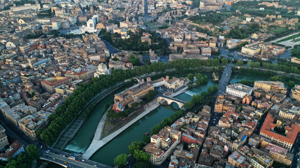 Aerial view of hospital on the Tiber Island, on the Tiber River, Rome, Italy. Coliseum.