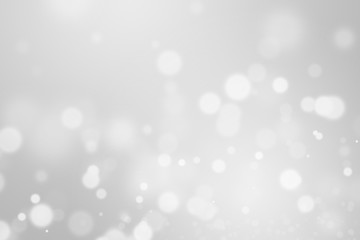 Obraz na płótnie Canvas Silver light background with blur bokeh. beautiful christmas backdrop. festive defocused. cosmetic advertising design