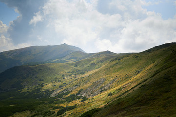 Obraz na płótnie Canvas Mountains in summer. Green mountain range view