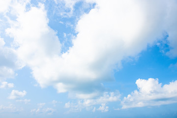 Nature Bright blue Sky with white clouds on blackground. Beautiful sky and clouds in the afternoon.