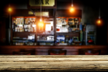 Naklejka na ściany i meble Table background of free space and blurred background of bar 
