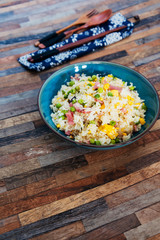 Homemade Chinese fried rice with vegetables and fried eggs