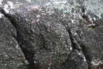 Uneven texture of stone, cobblestone. Grunge old background for your design