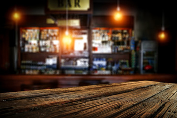 Table background of free space and blurred background of bar 