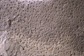Uneven texture of stone, cobblestone. Grunge old background for your design