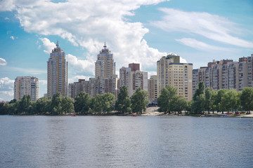 Fototapeta na wymiar Beautiful city of Kiev in the summer, spring. River Dnieper with a beautiful sky. Stock photo