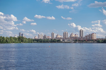 Beautiful city of Kiev in the summer, spring. River Dnieper with a beautiful sky. Stock photo