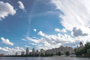 Beautiful city of Kiev in the summer, spring. River Dnieper with a beautiful sky. Stock photo