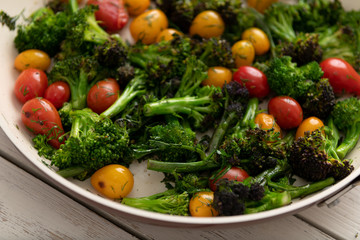 Green Broccoli Florets Sauteed with Heirloom Cherry Tomatoes and Fresh Herbs