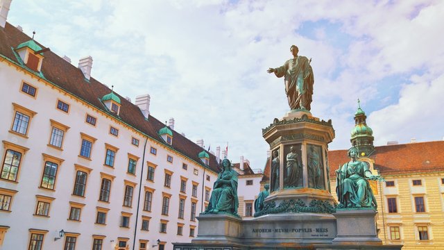 Innerer Burghof of Hofburg imperial Palace, Part of the Hofburg with Amalientrakt and Amalienburg. Monument to Emperor Franz I of Austria. Exterior in center of Vienna, capital of Austria, at summer.