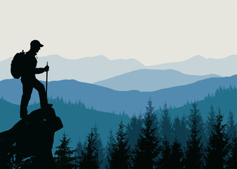 Man on top of a mountain