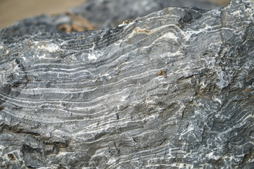 Uneven texture of stone, cobblestone. Grunge old background for your design