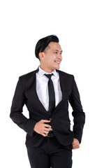 Studio portrait of handsome and confident young business man on white background