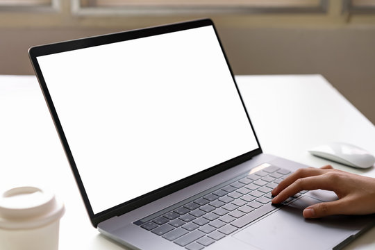 Woman Using Laptop On The Table, Mock Up Of Blank Screen.