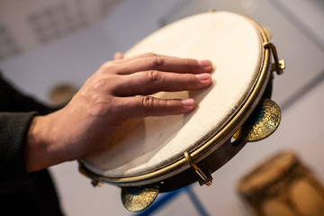 man playing a percussion instrument musician rerbound performance hand smash beating knock shock...