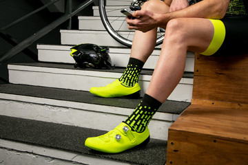 cycling shoes next to the cyclist
