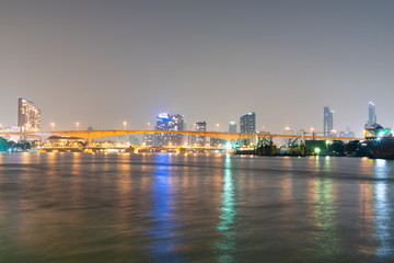 Fototapeta na wymiar Bridge over river in Bangkok city.