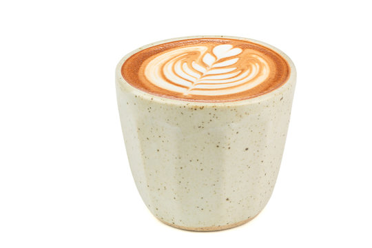 Side view of Hot latte coffee with latte art in a vintage cup isolated on white background. (Clipping path inside)