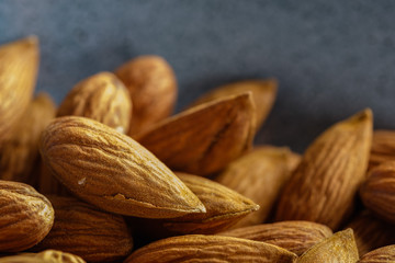 Healthy food. Fresh almond closeup on wooden table