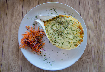 Baked mased Potato cheese, sprinkle with Oregano powder