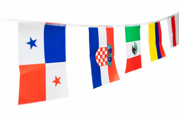 Triangle flags of various countries hanging on the rope