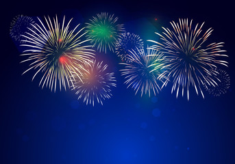 colorful fireworks vector on dark blue background with sparking bokehs