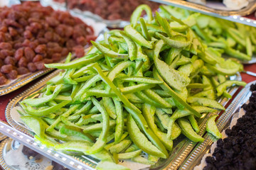 Counter with green dried fruits. Sweet dried snacks. Healthy Food for Vegatarians