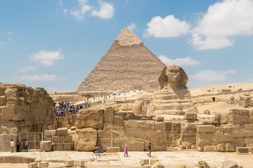 Giza, Egypt - April 19, 2019: The pyramid of Khafre and the Great Sphinx of Giza