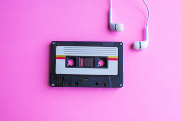 retro of tape cassette on pink background. soft focus.