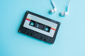 Fototapeta premium retro of tape cassette on blue and pink background. soft focus.