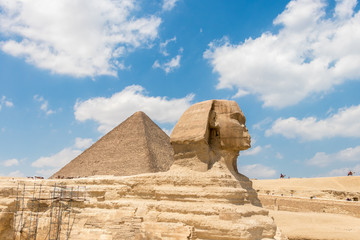 The pyramid of Khufu and the Great Sphinx of Giza with beautiful sky