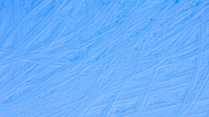 background of blue frozen snow