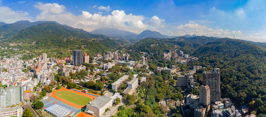 Aerial view of the metro line and cityscape of Xinbeitou area