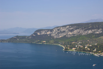 Fototapeta na wymiar Scenic mountain views of the mountains, city and lake Garda