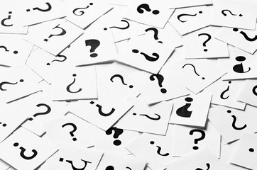 Pile of question mark signs scattered around