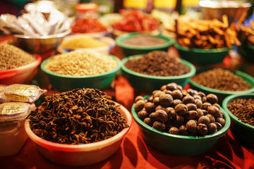 Colorful spices in bags at a market in Goa