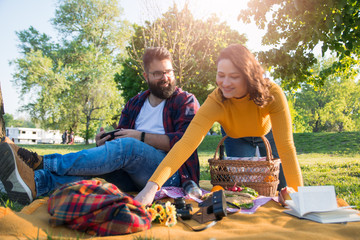 Young couple enjoying on a picnic