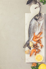 Seafood on grey concrete background