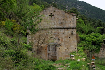 Fototapeta na wymiar Church of Santa Maria di Mirteto in the abandoned monastic village in the Pisan mountains